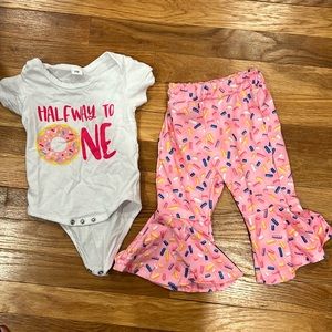 Baby girl halfway to one outfit!